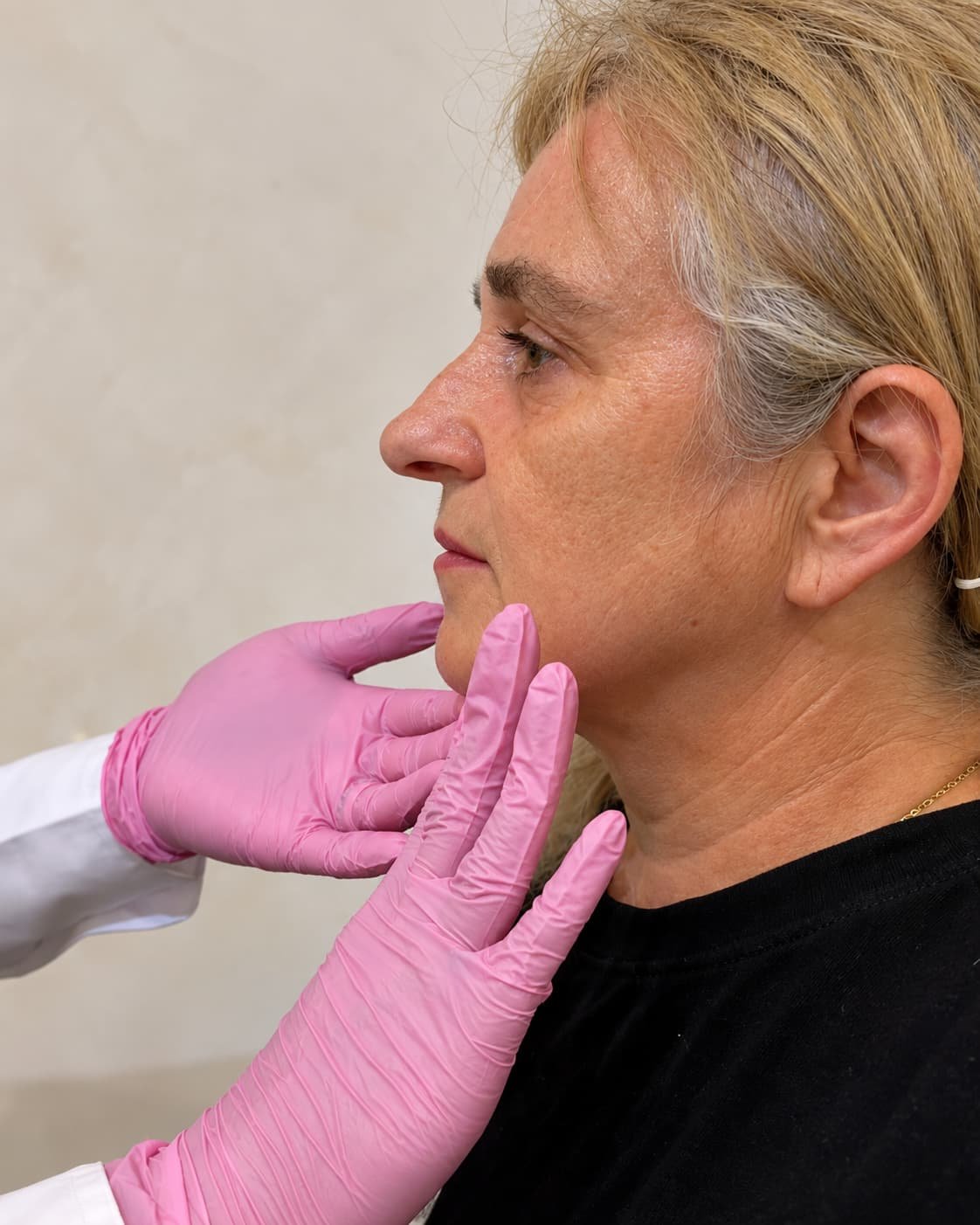 Lenka consulting with a client at Alixir Aesthetics